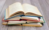 stack-of-books-on-the-table-picture-id636337794.jpg